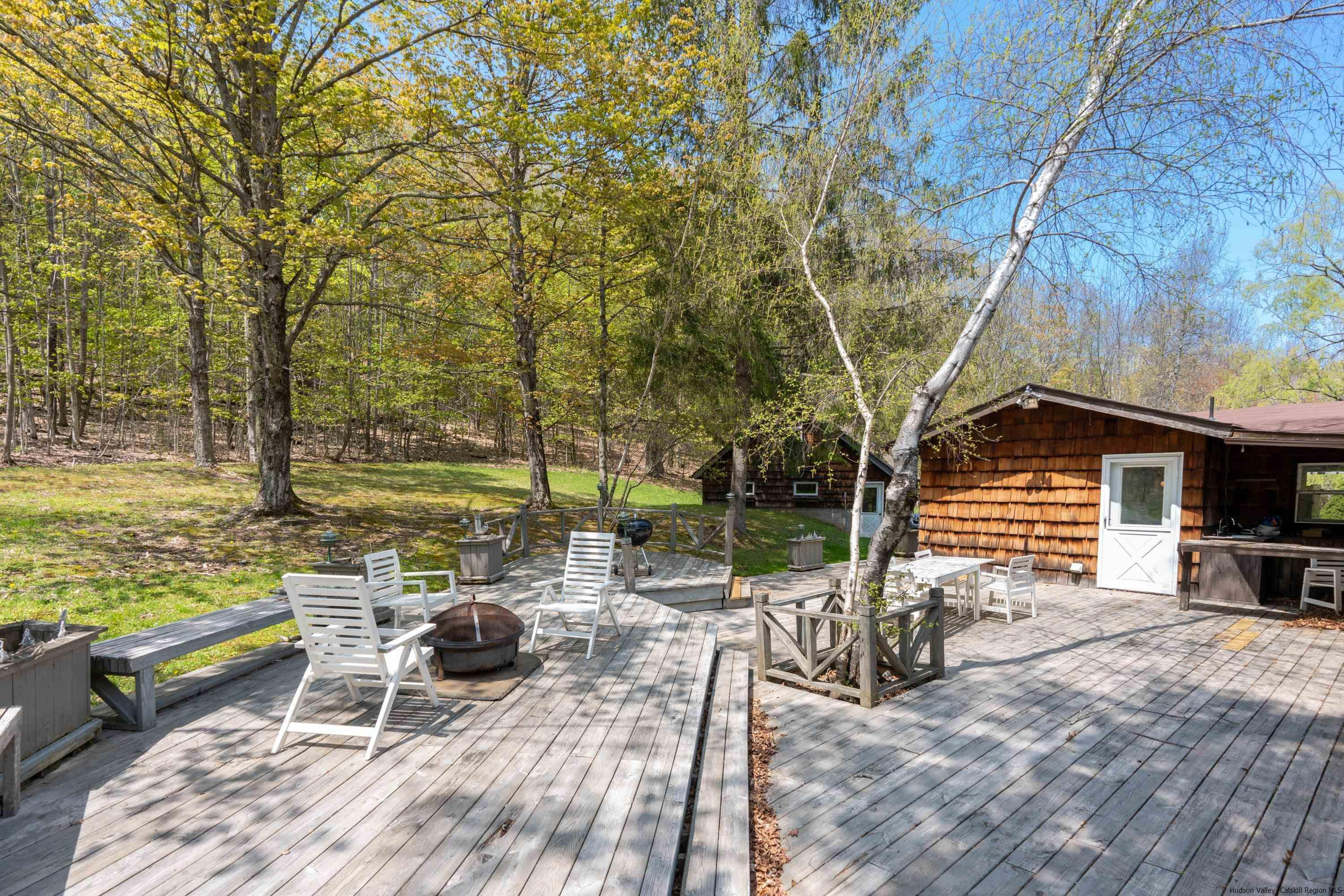 167 Old Towne Road Roxbury, NY 12421 - Photo 24 of 29 a view of a patio with a table chairs and a barbeque