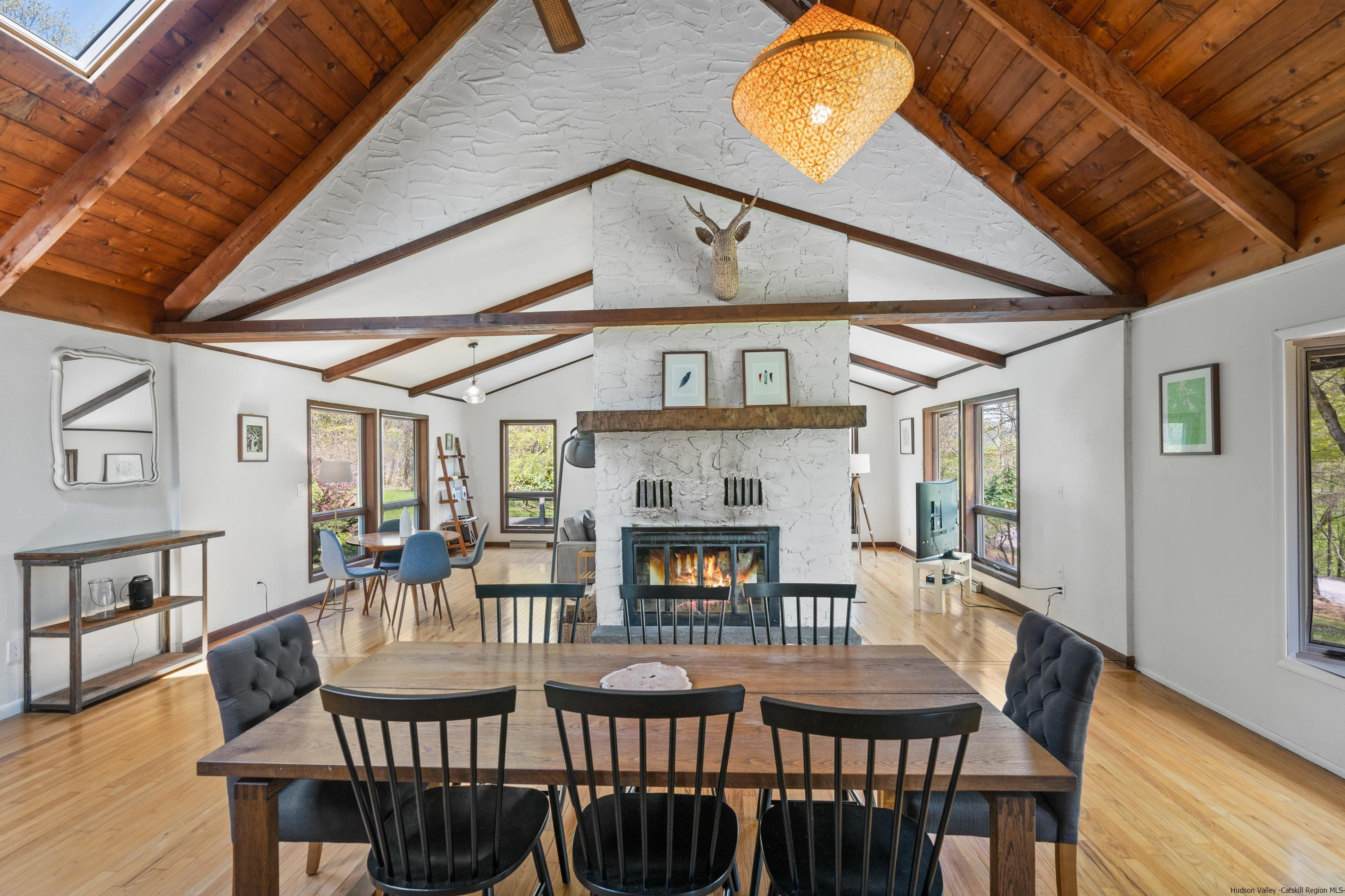 167 Old Towne Road Roxbury, NY 12421 - Photo 10 of 29 a view of a dining room with furniture window and wooden floor