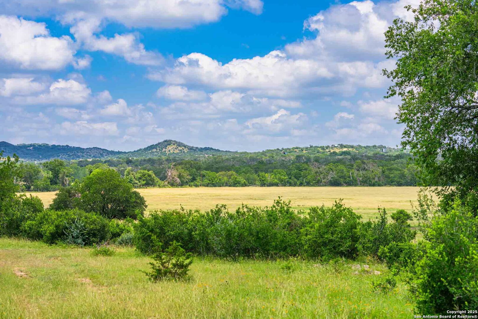 8 Cypress Creek Road Comfort, TX 78013 - Photo 16 of 39 a view of lake with houses in the background