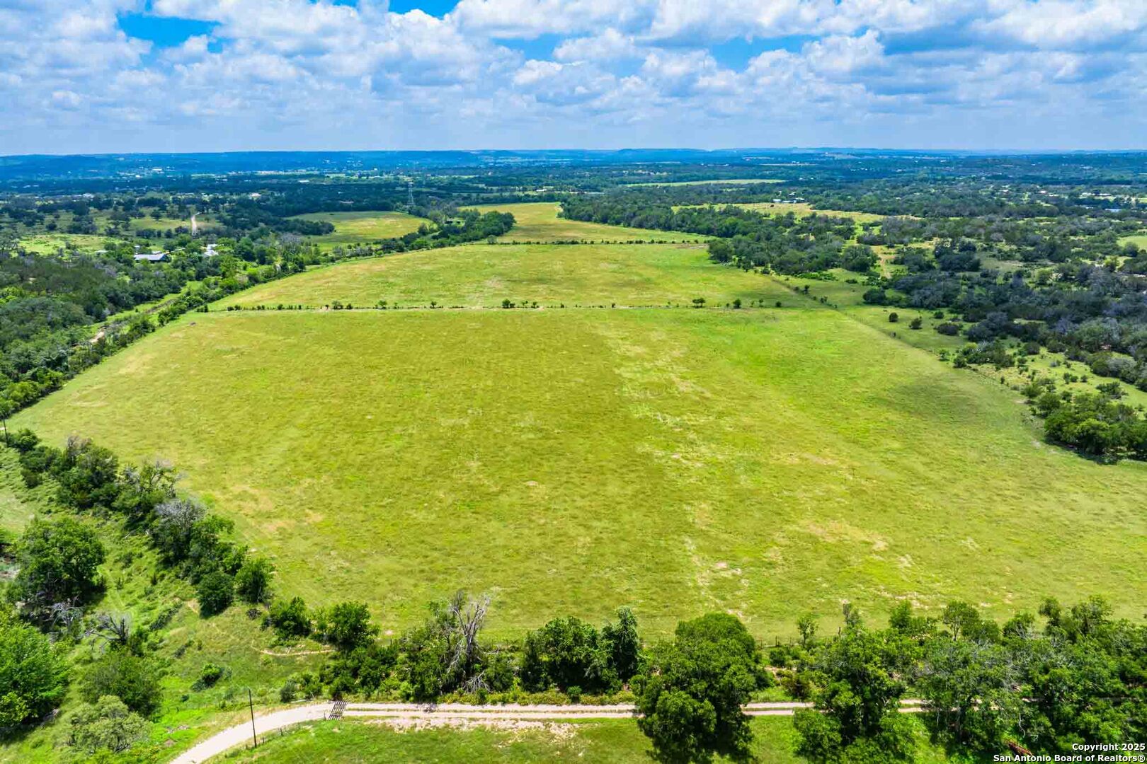 8 Cypress Creek Road Comfort, TX 78013 - Photo 2 of 39 a view of an outdoor space with a lake view