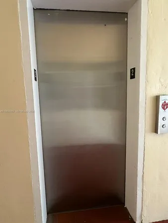 a bathroom with a glass door