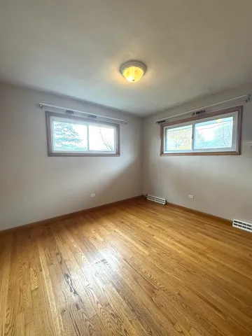 a view of a room with a windows