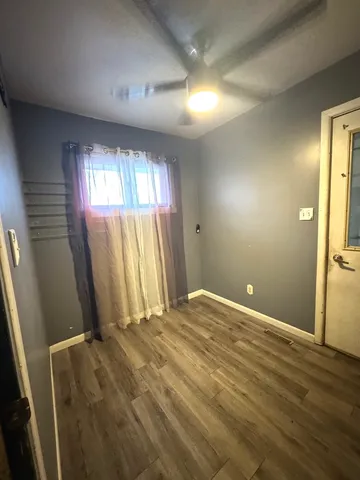 a view of a room with a furniture