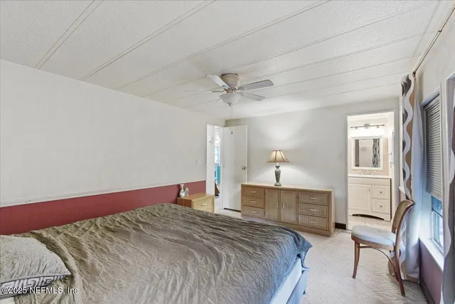 a room with furniture a chandelier couch and a chandelier