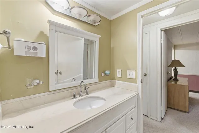 a view of a big room with balcony and floor to ceiling window