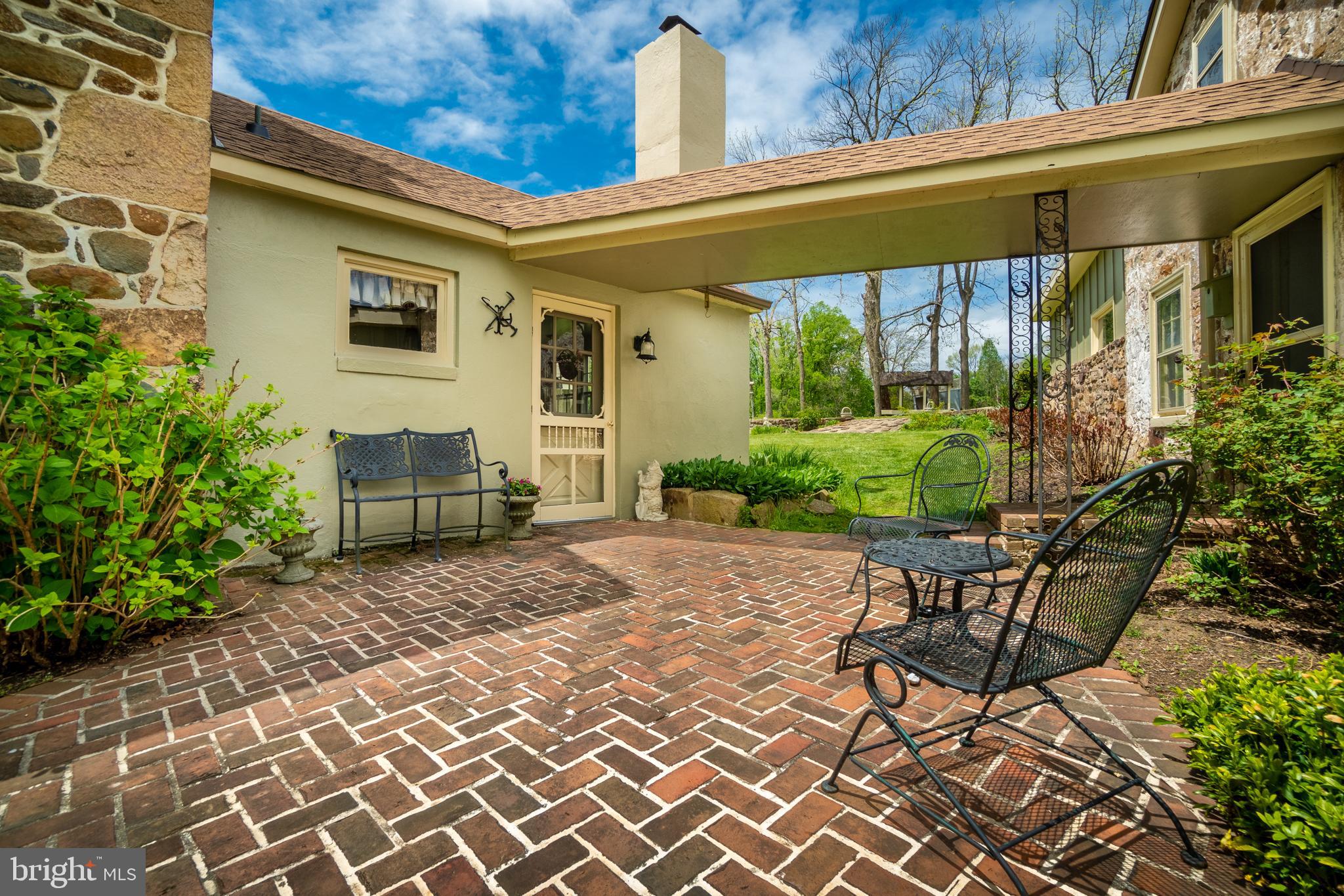1473 St Matthews Road Chester Springs, PA 19425 - Photo 12 of 60 Brick Patio with Breezeway from Kitcen to Cottage