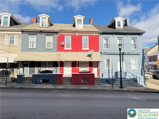a front view of multi story residential apartment building