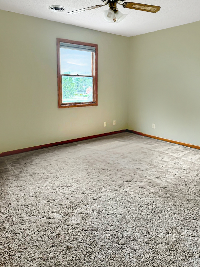1008 Ascot Drive Rantoul, IL 61866 - Photo 20 of 24 an empty room with a window