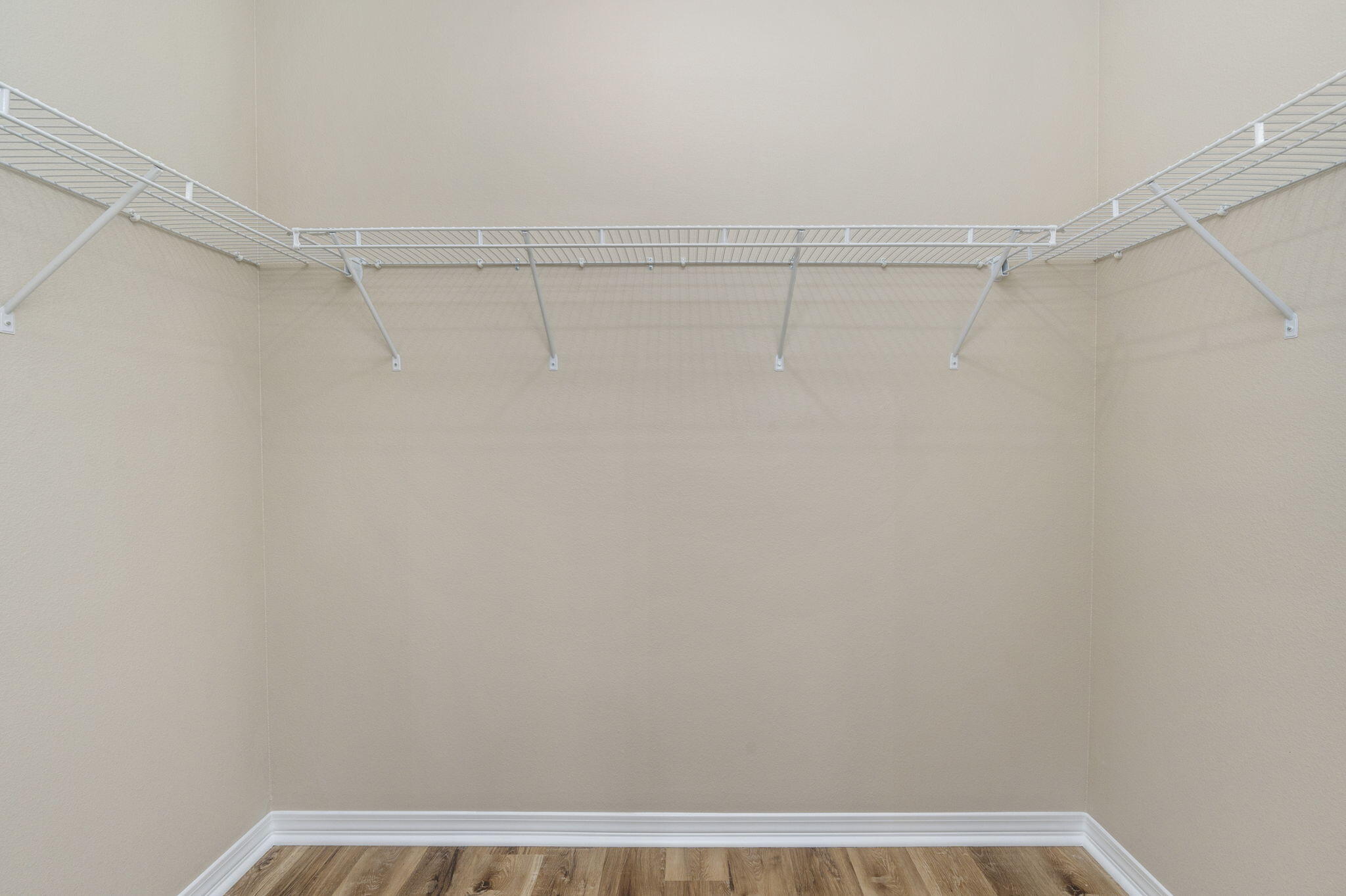1357 East Chestnut Avenue Crestview, FL 32539 - Photo 25 of 37 a view of a room with racks on the wall