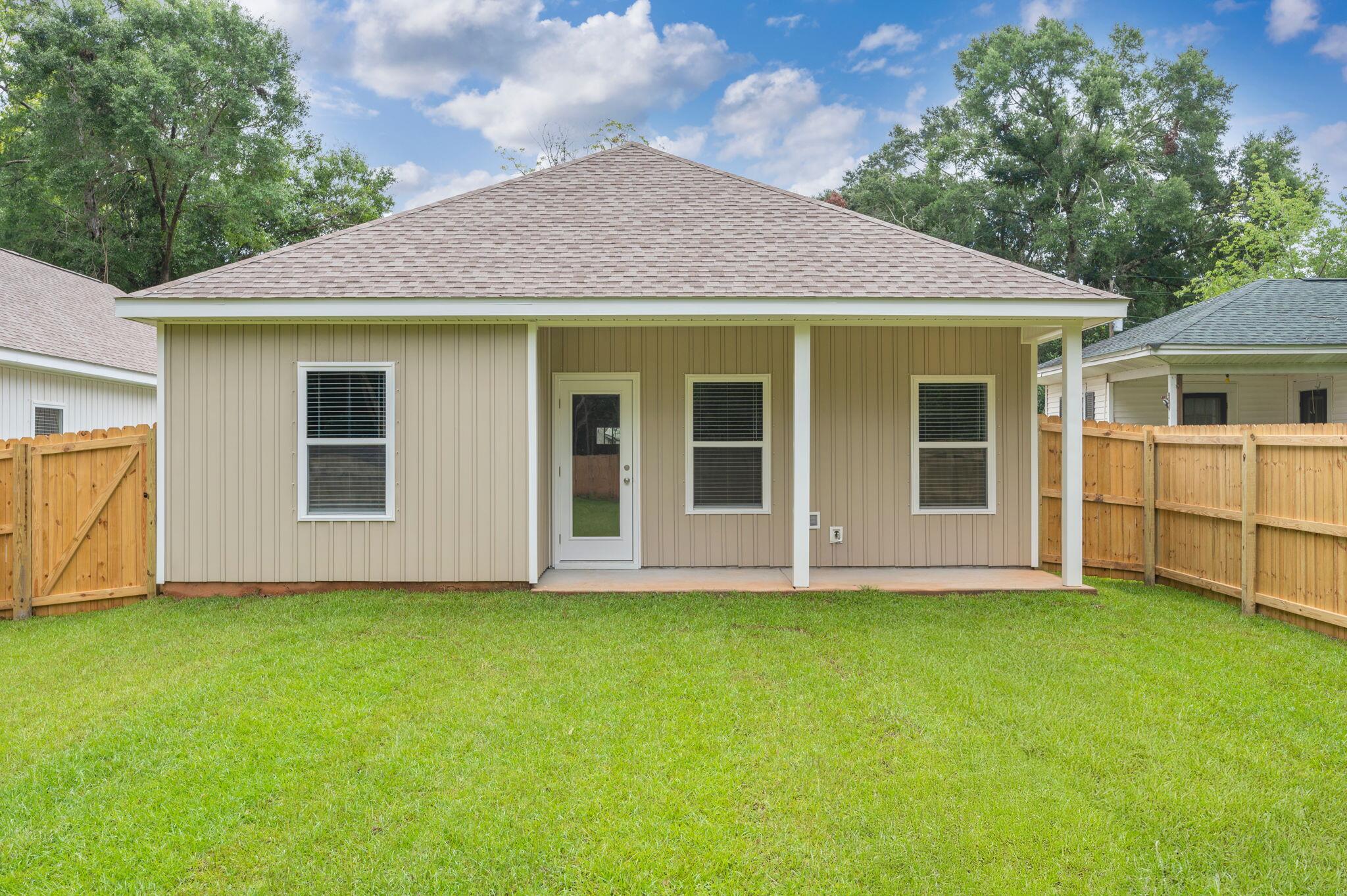 1357 East Chestnut Avenue Crestview, FL 32539 - Photo 35 of 37 a view of house with backyard of a house