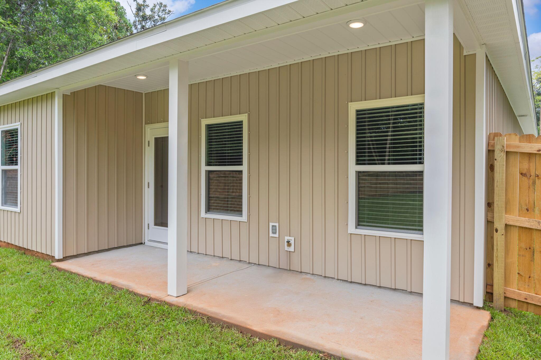 1357 East Chestnut Avenue Crestview, FL 32539 - Photo 36 of 37 a view of backyard with porch