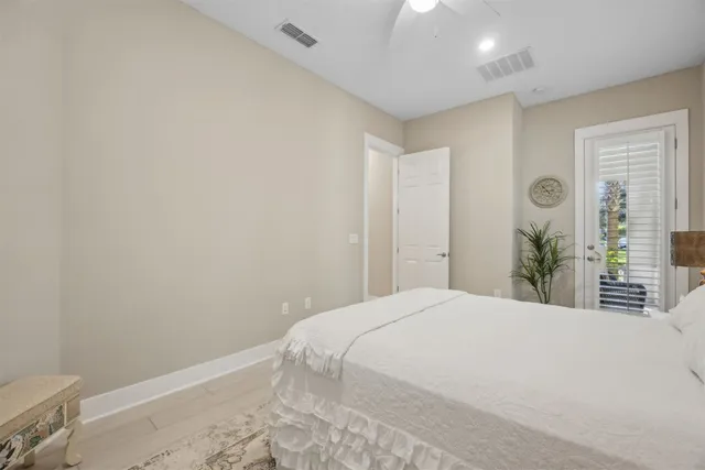 a bathroom with double sink and a mirror