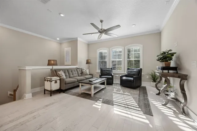 a view of yard with swimming pool and trees