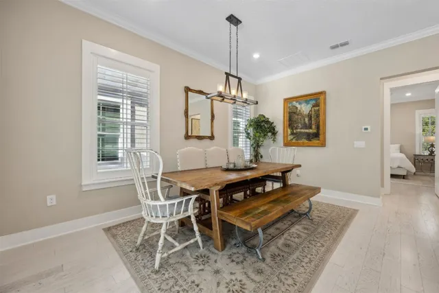 an aerial view of residential houses with outdoor space and street view