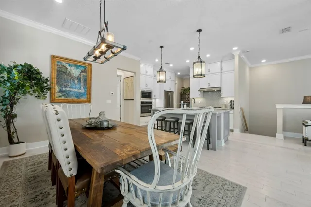 a view of a hallway with entryway of a house