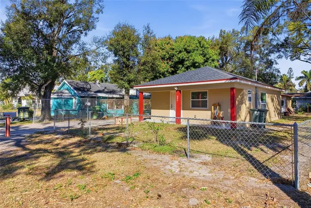 front view of a house with a small yard