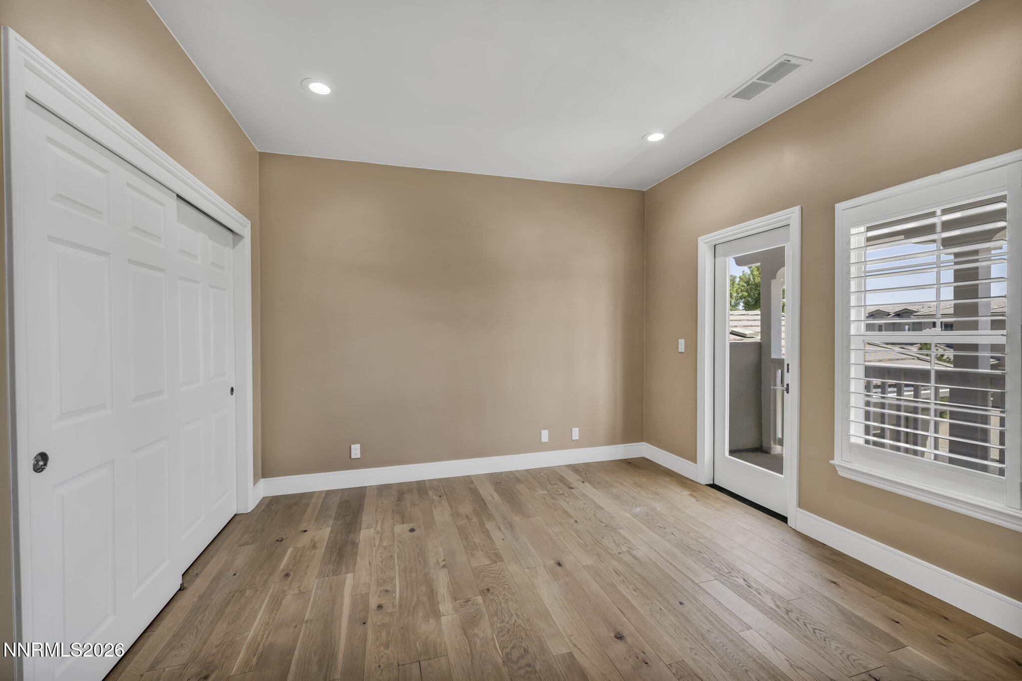 2965 Roundrock Court Reno, NV 89511 - Photo 24 of 40 wooden floor in an empty room with a window