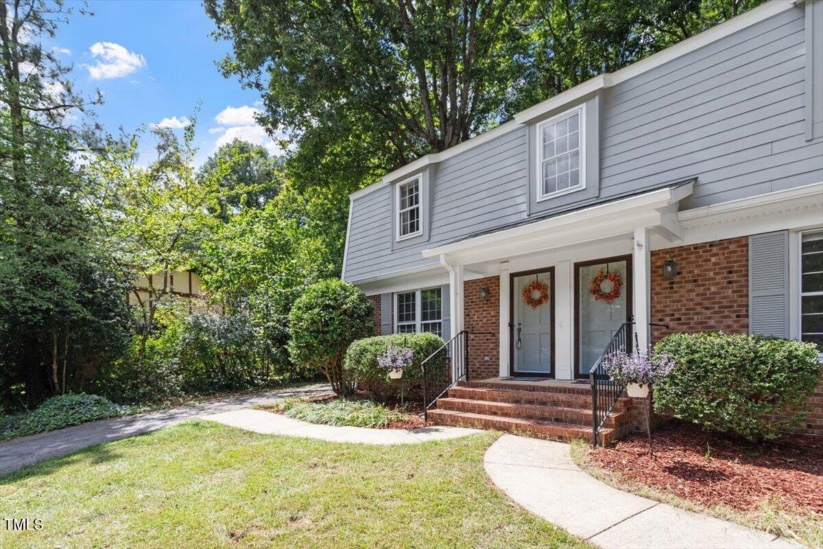 5309 Covey Court Raleigh, NC 27609 - Photo 11 of 47 a view of a house with backyard and sitting area