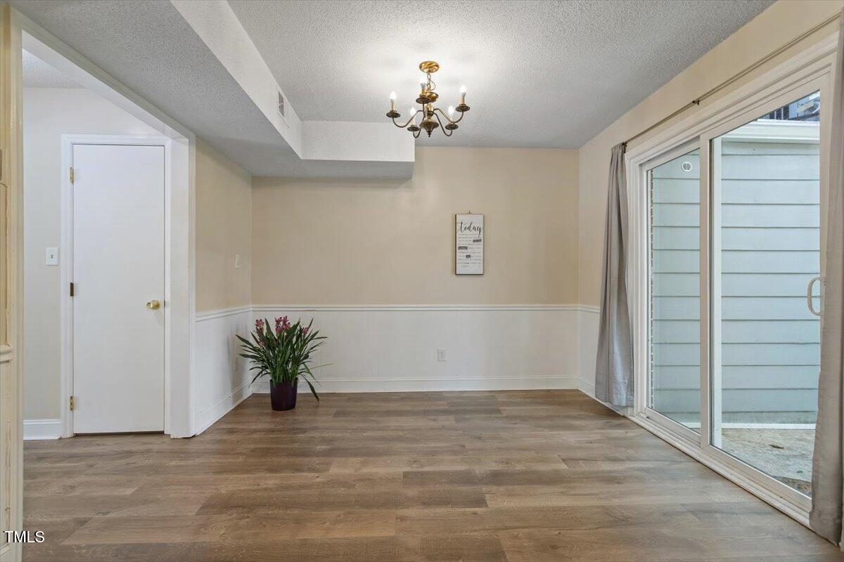 5309 Covey Court Raleigh, NC 27609 - Photo 20 of 47 a view of an empty room with a window