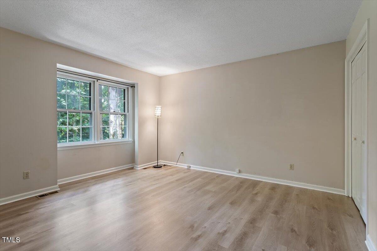 5309 Covey Court Raleigh, NC 27609 - Photo 26 of 47 a view of an empty room with a window