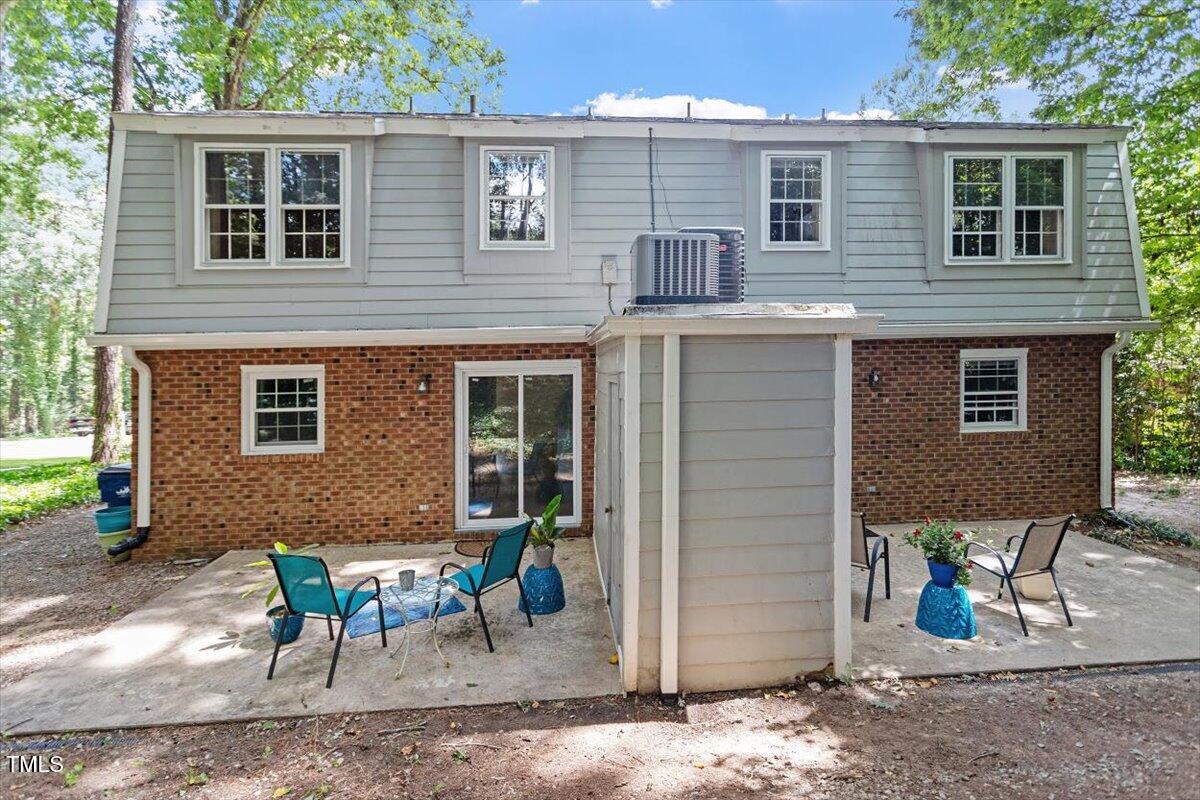 5309 Covey Court Raleigh, NC 27609 - Photo 43 of 47 a view of a house with patio