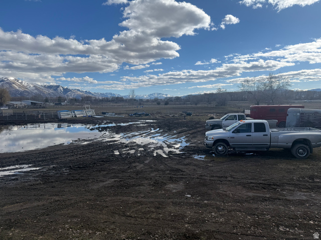 Undisclosed Address Logan, UT 84321 - Photo 5 of 8 View of parking featuring a mountain view