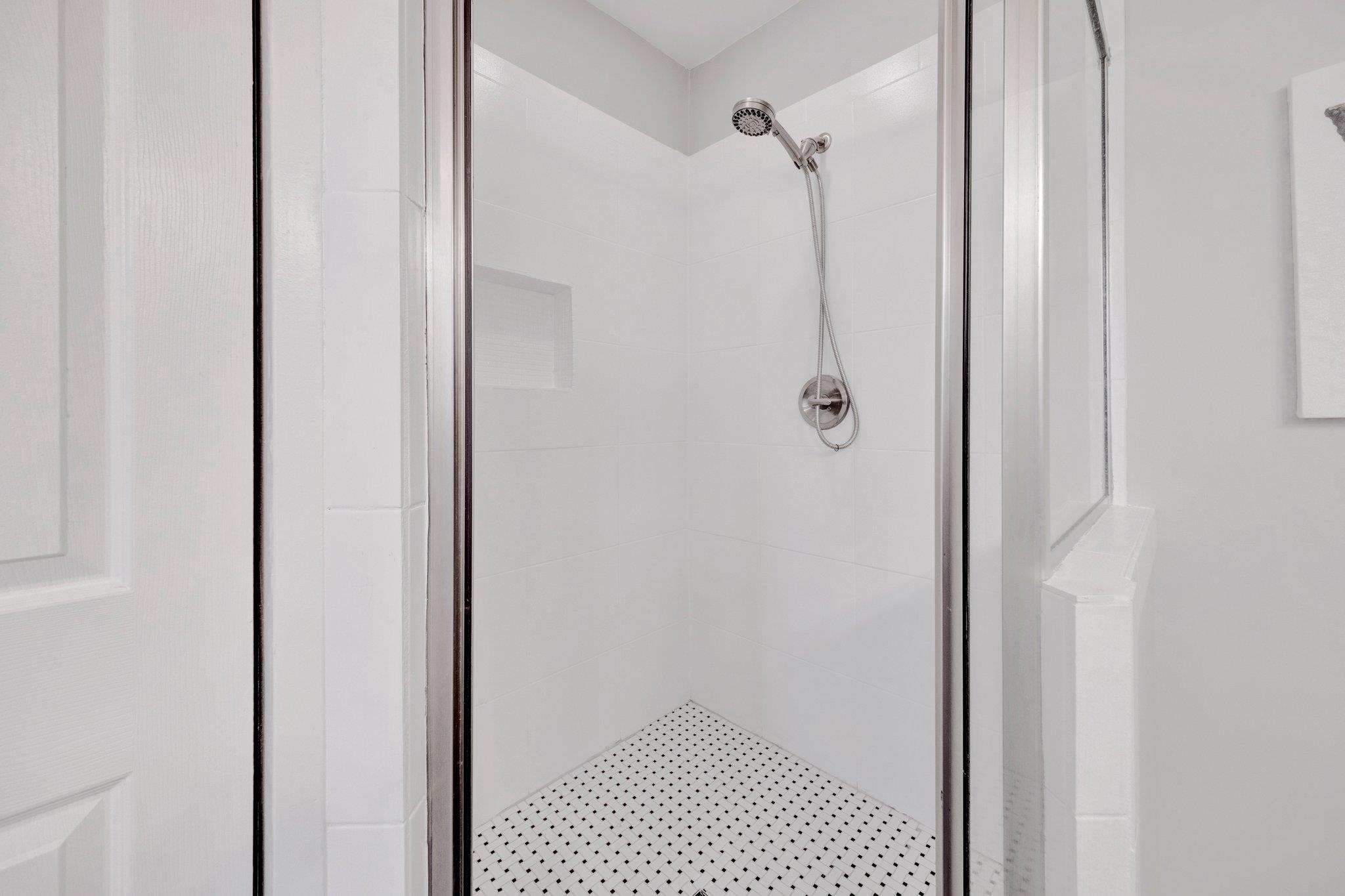 5468 Mason Road Memphis, TN 38120 - Photo 23 of 36 a bathroom with a shower