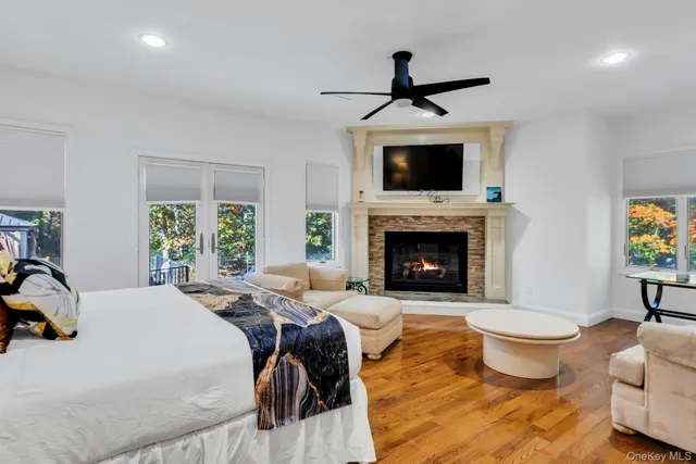 a bed room with a bed and a fireplace