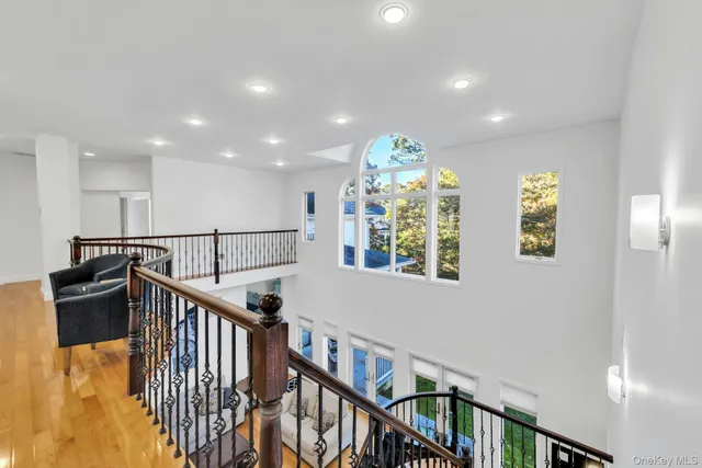 a view of entryway with wooden floor