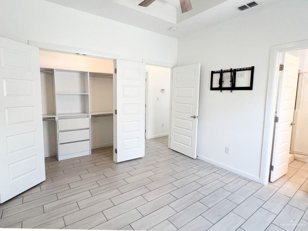 1723 West Marlin Street, Unit 3 Pharr, TX 78577 - Photo 3 of 7 an empty room with closet and cabinet