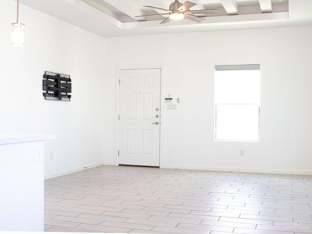 1723 West Marlin Street, Unit 3 Pharr, TX 78577 - Photo 5 of 7 an empty room with a empty space