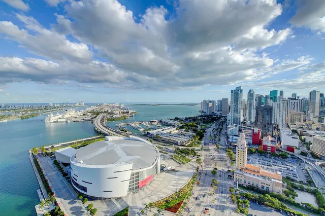a view of a swimming pool with an outdoor seating