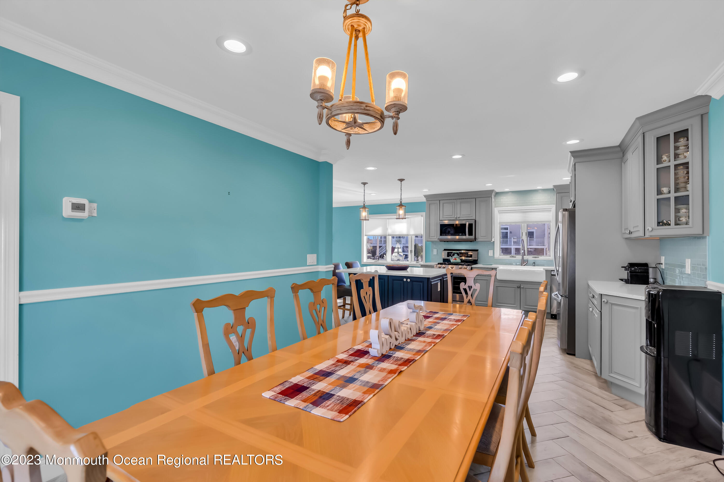 1801 Boat Point Drive Point Pleasant, NJ 08742 - Photo 14 of 76 a view of a dining room with furniture and wooden floor