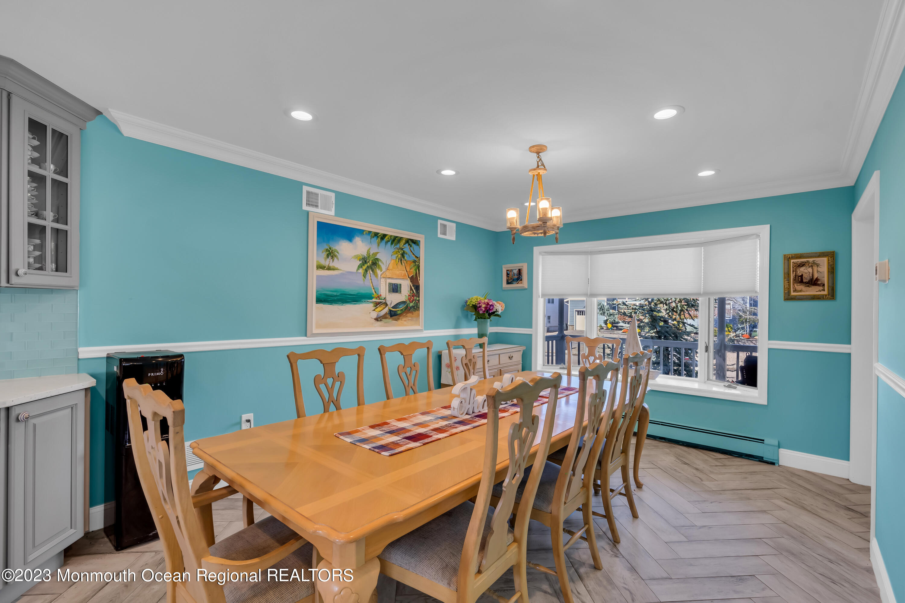 1801 Boat Point Drive Point Pleasant, NJ 08742 - Photo 16 of 76 a view of a dining room with furniture and wooden floor