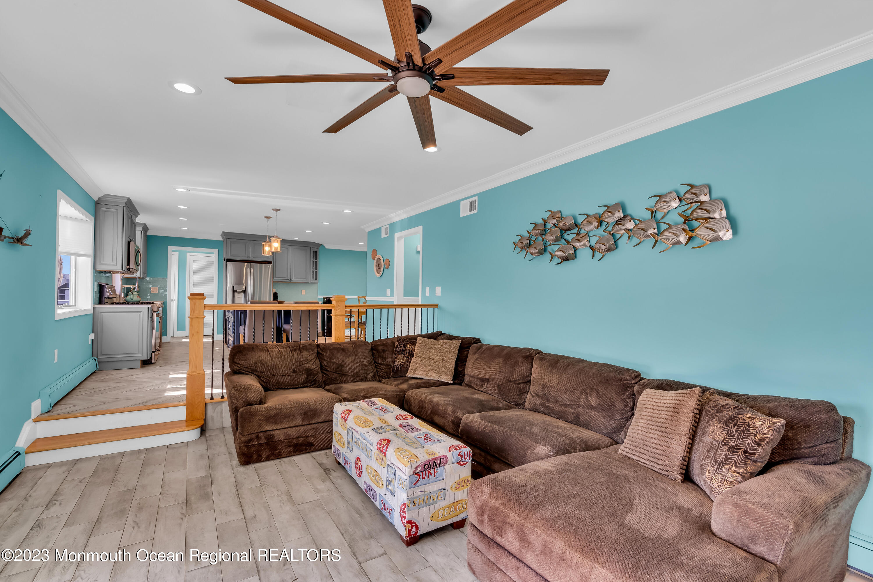 1801 Boat Point Drive Point Pleasant, NJ 08742 - Photo 26 of 76 a living room with furniture and kitchen view