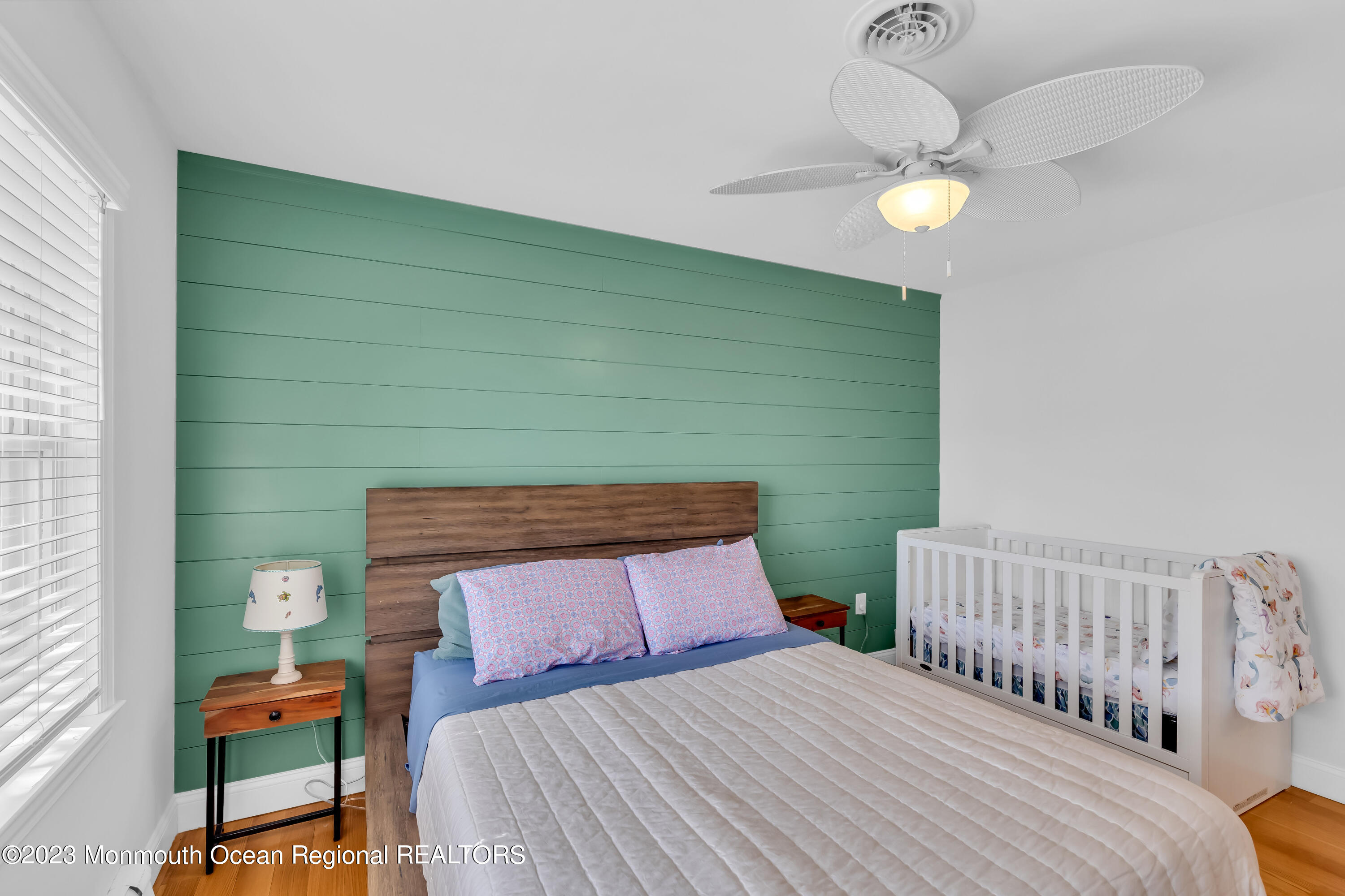 1801 Boat Point Drive Point Pleasant, NJ 08742 - Photo 34 of 76 a bedroom with a bed and a window