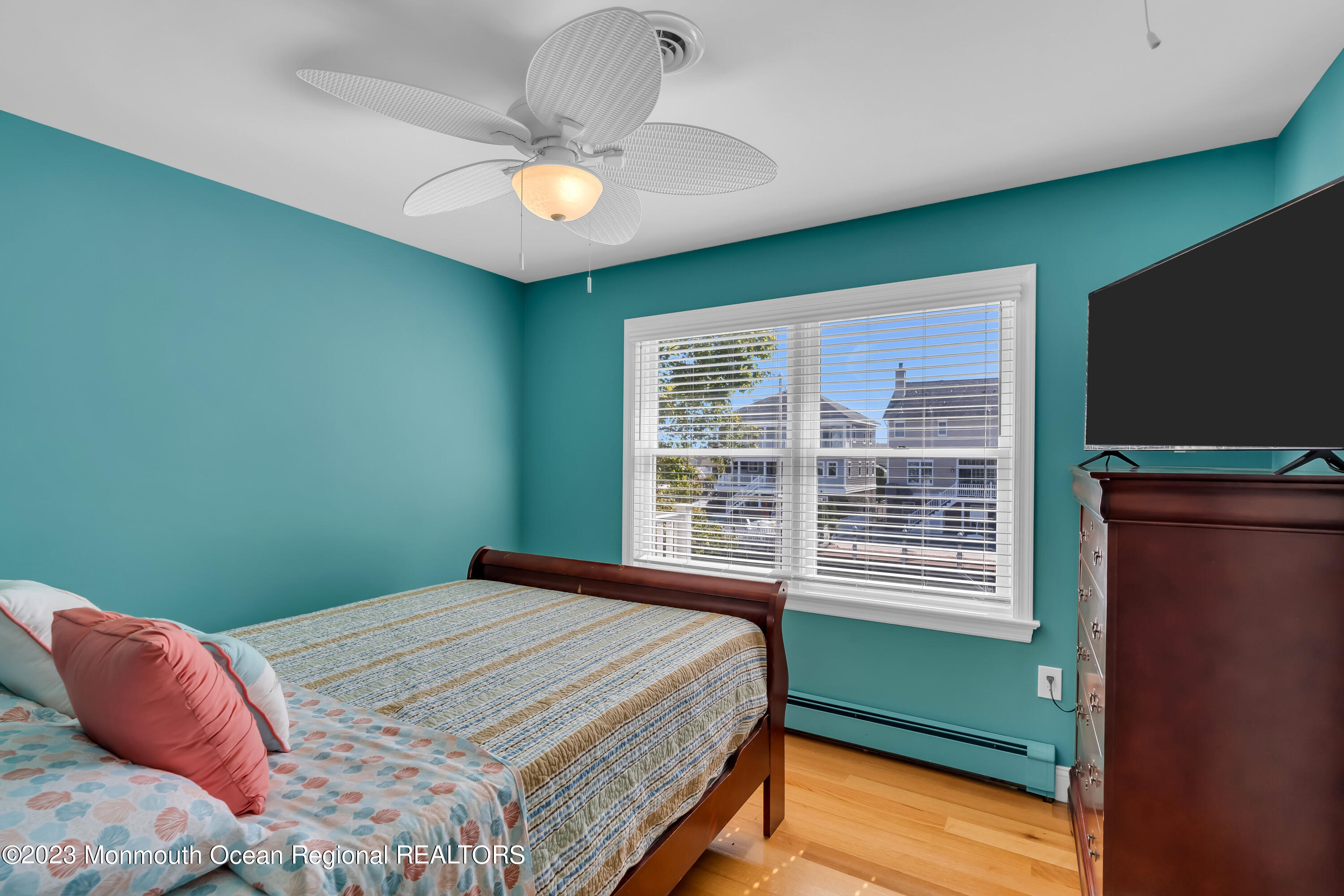 1801 Boat Point Drive Point Pleasant, NJ 08742 - Photo 35 of 76 a bedroom with a bed and a window