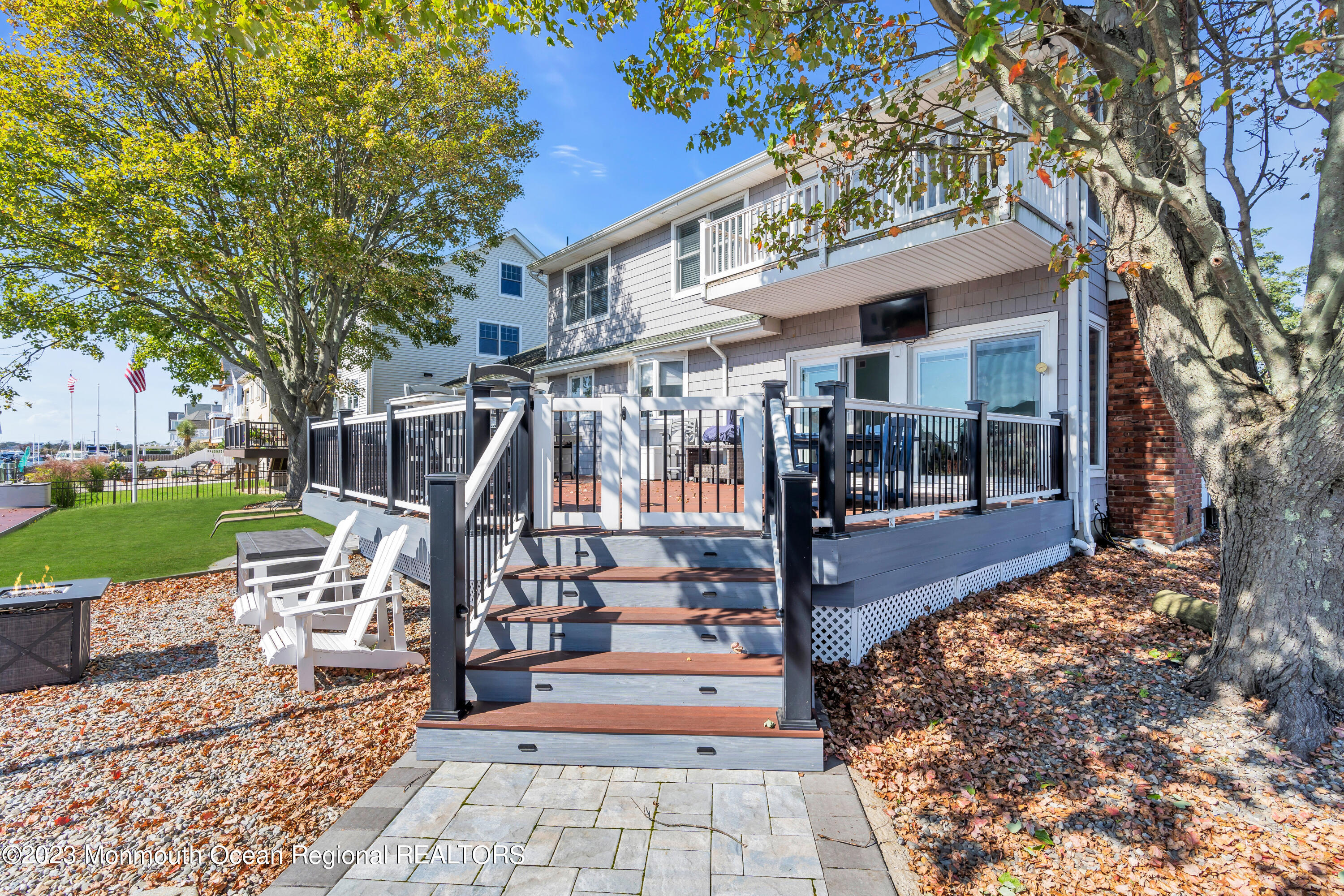 1801 Boat Point Drive Point Pleasant, NJ 08742 - Photo 49 of 76 a view of a chairs and bench in the patio