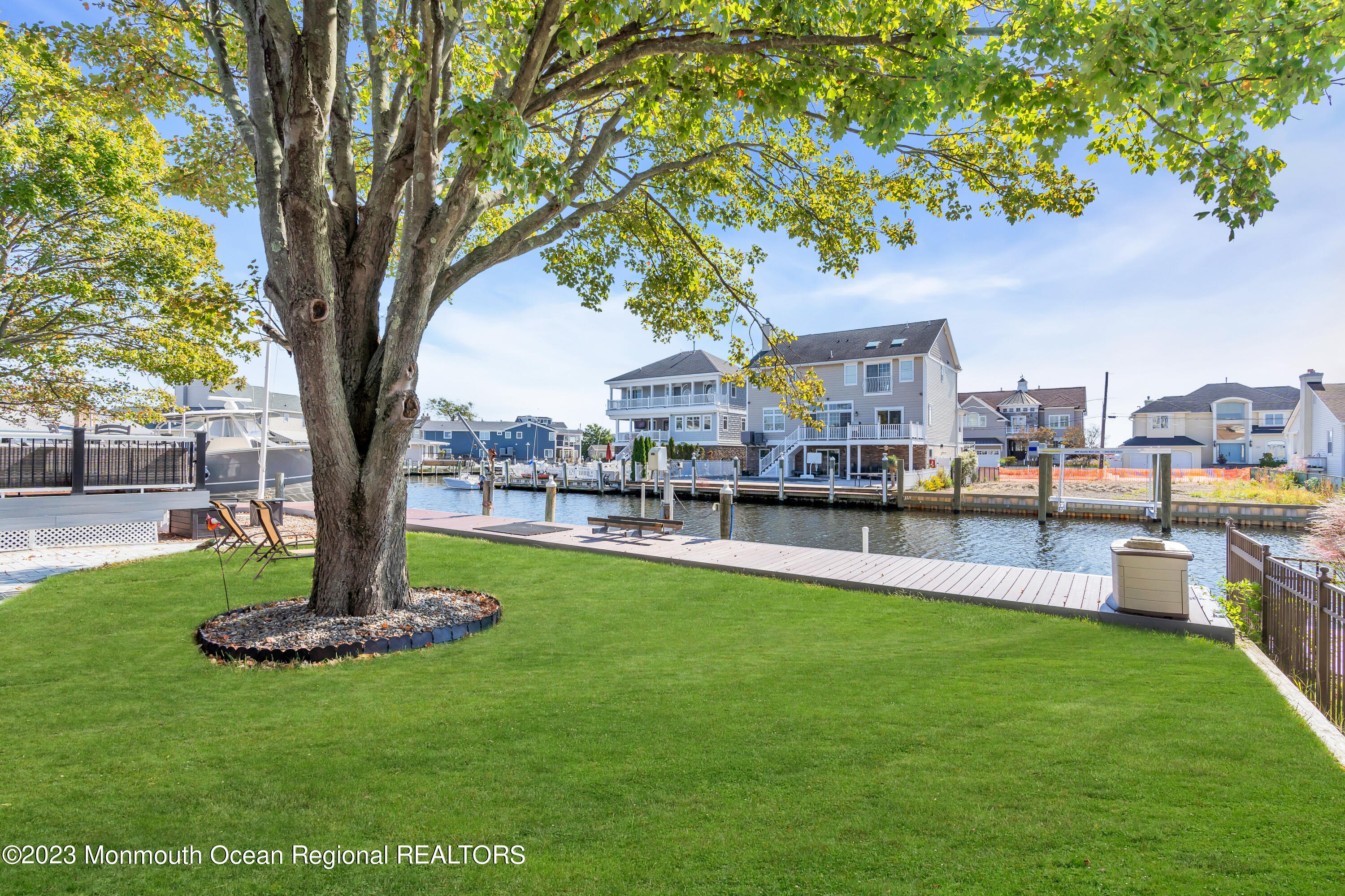 1801 Boat Point Drive Point Pleasant, NJ 08742 - Photo 55 of 76 a house view with a sitting space and garden