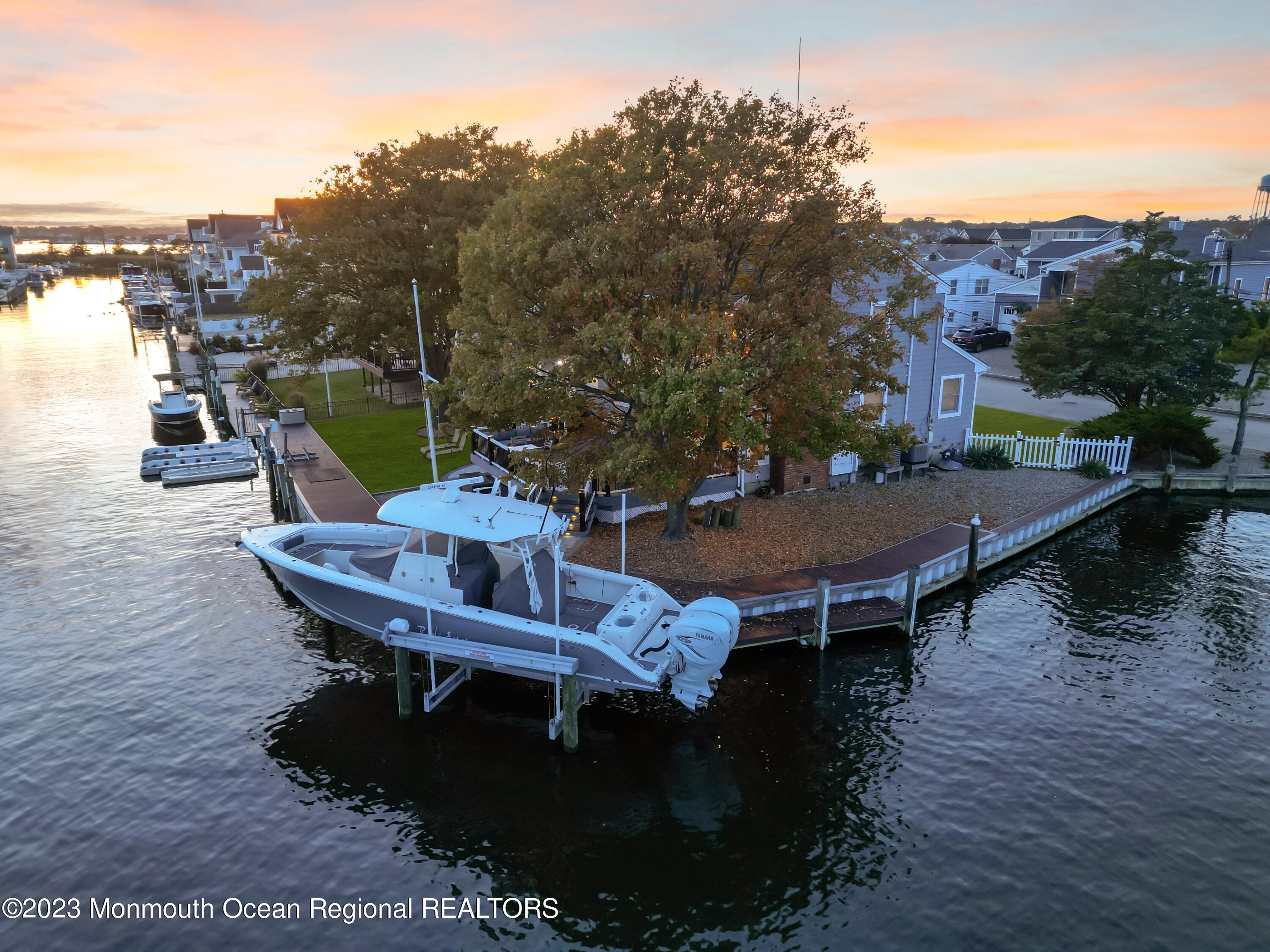 1801 Boat Point Drive Point Pleasant, NJ 08742 - Photo 63 of 76 a view of a balcony with furniture and wooden floor