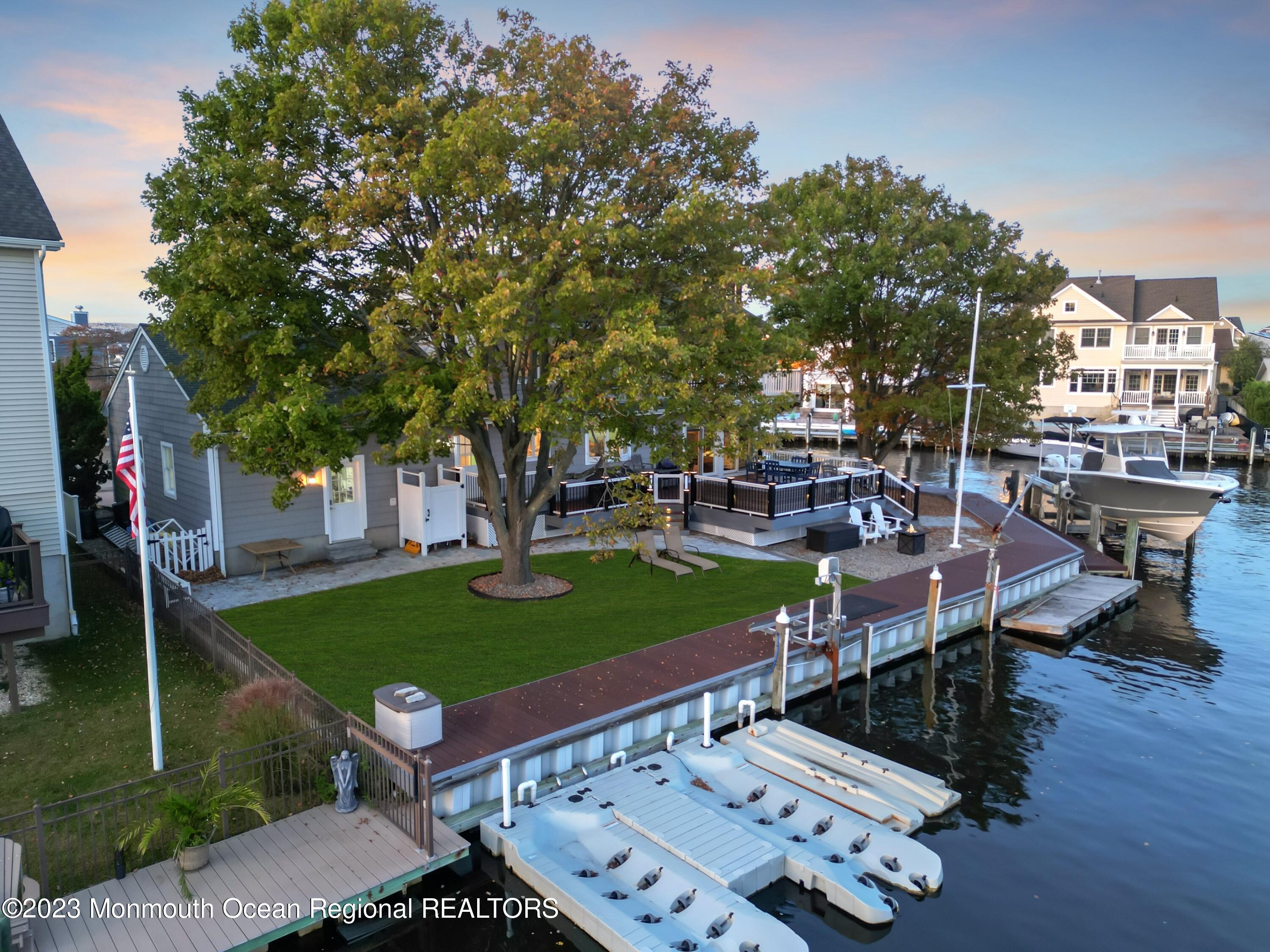 1801 Boat Point Drive Point Pleasant, NJ 08742 - Photo 66 of 76 a view of a backyard with sitting area