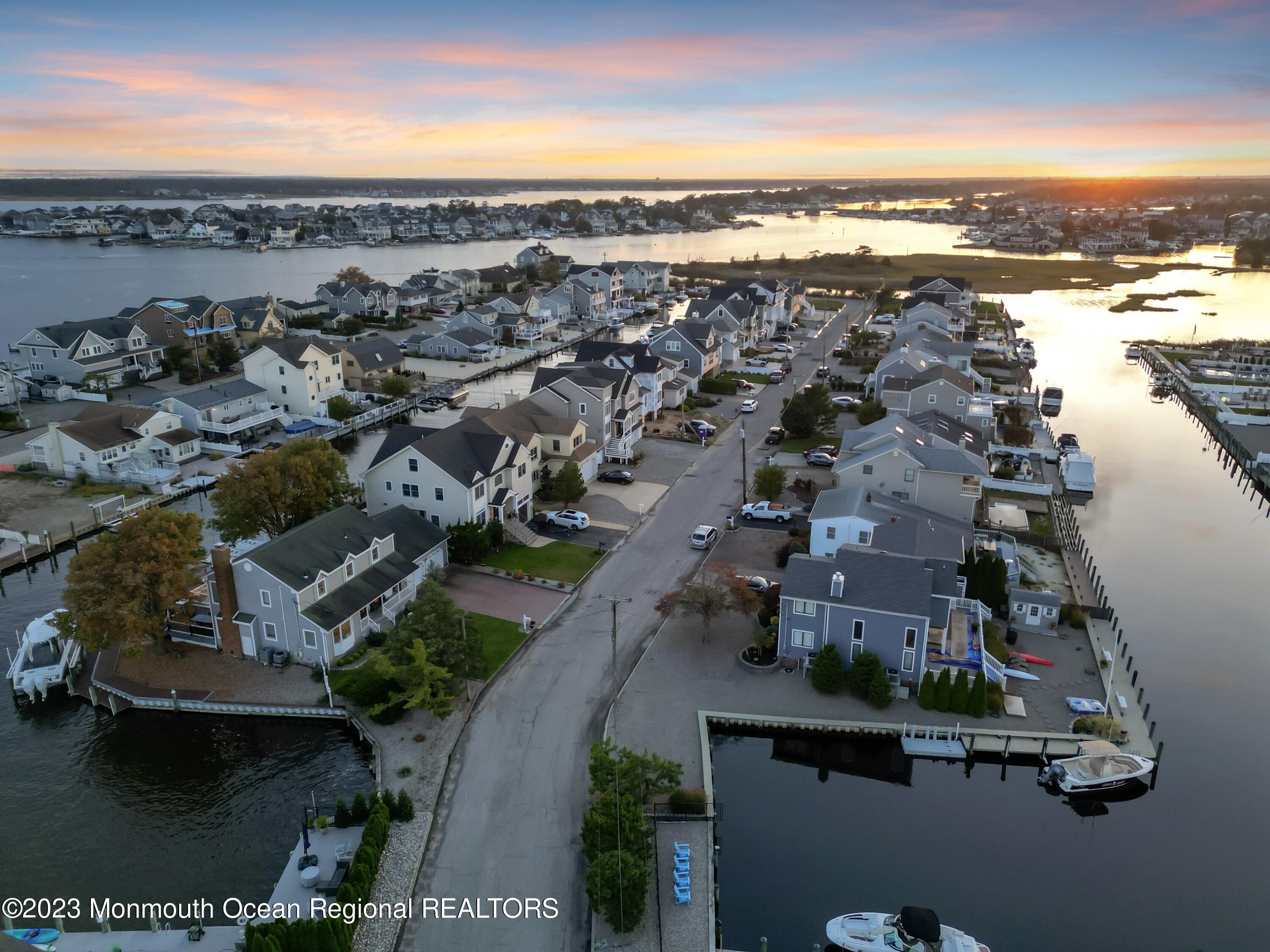 1801 Boat Point Drive Point Pleasant, NJ 08742 - Photo 68 of 76 an aerial view of residential building with parking space