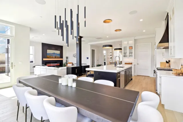 a living room with fireplace furniture and a flat screen tv