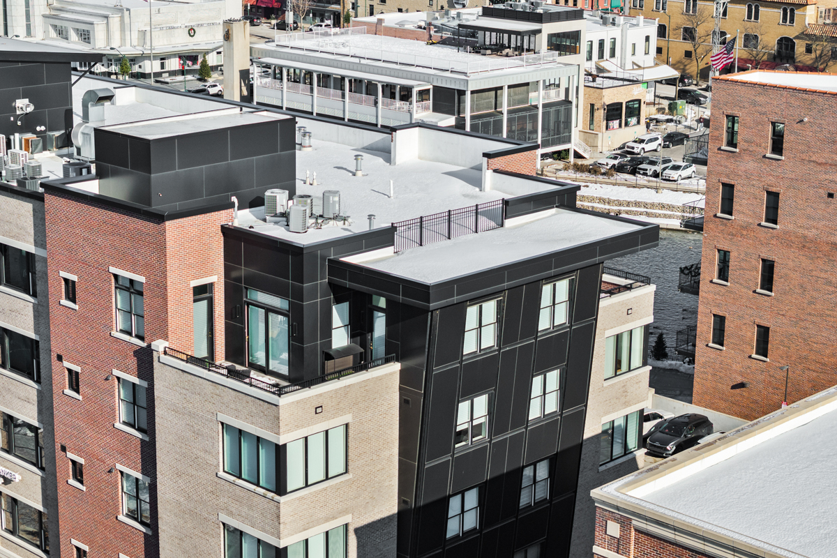 50 South 1st Street, Unit 5D St. Charles, IL 60174 - Photo 4 of 52 a front view of a building with a lot of windows