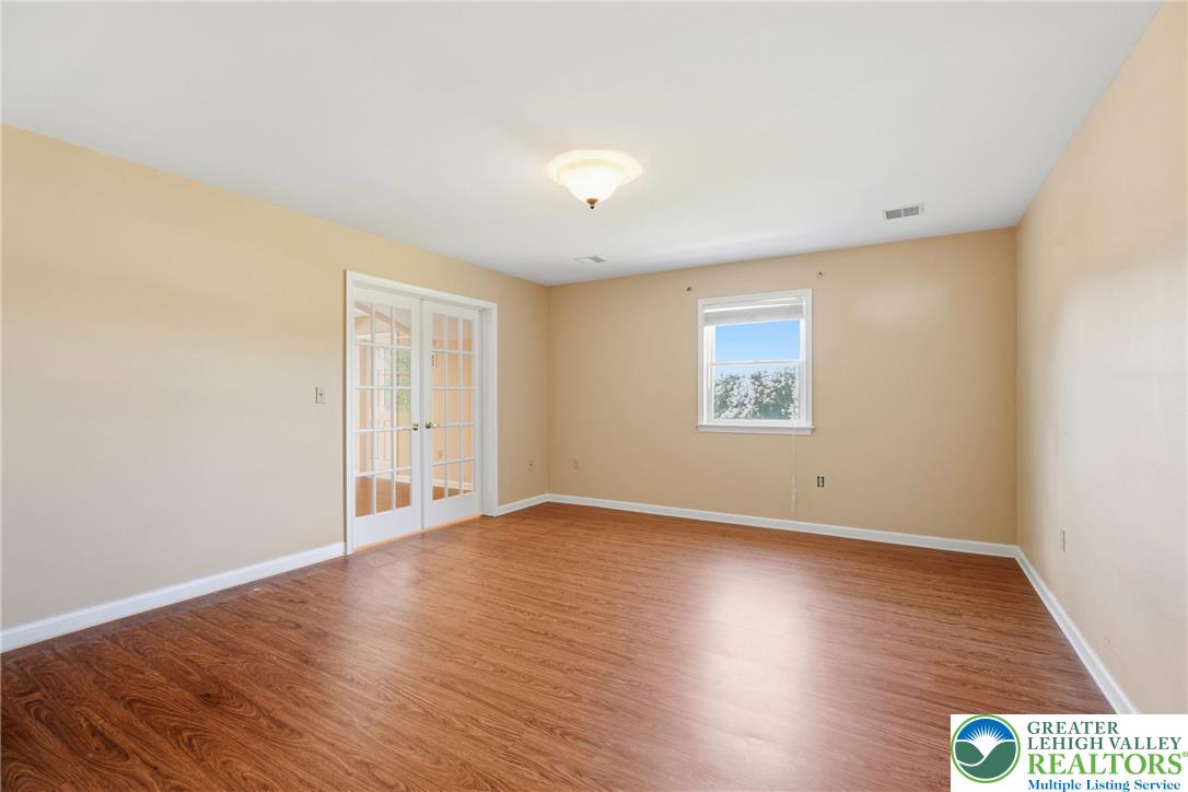 590 Fehr Road Nazareth, PA 18064 - Photo 38 of 79 Rich wood floors lay a beautiful foundation beneath classic French doors.
