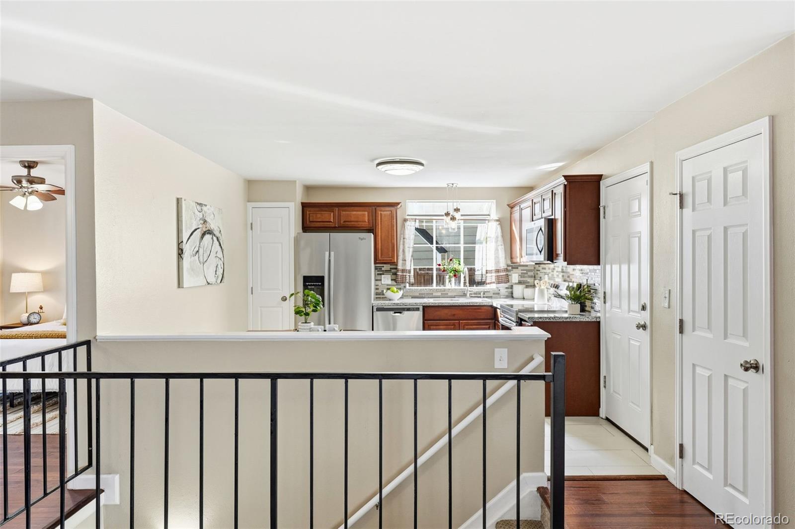 17660 Snowberry Way Parker, CO 80134 - Photo 11 of 38 a view of a living room and a window