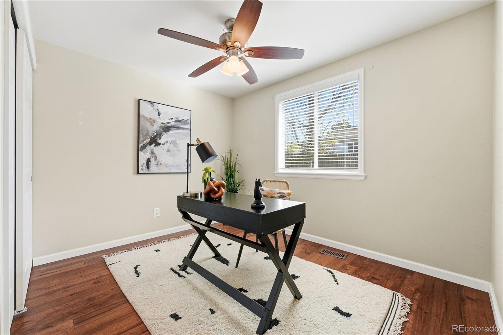17660 Snowberry Way Parker, CO 80134 - Photo 18 of 38 a workspace with furniture and a window