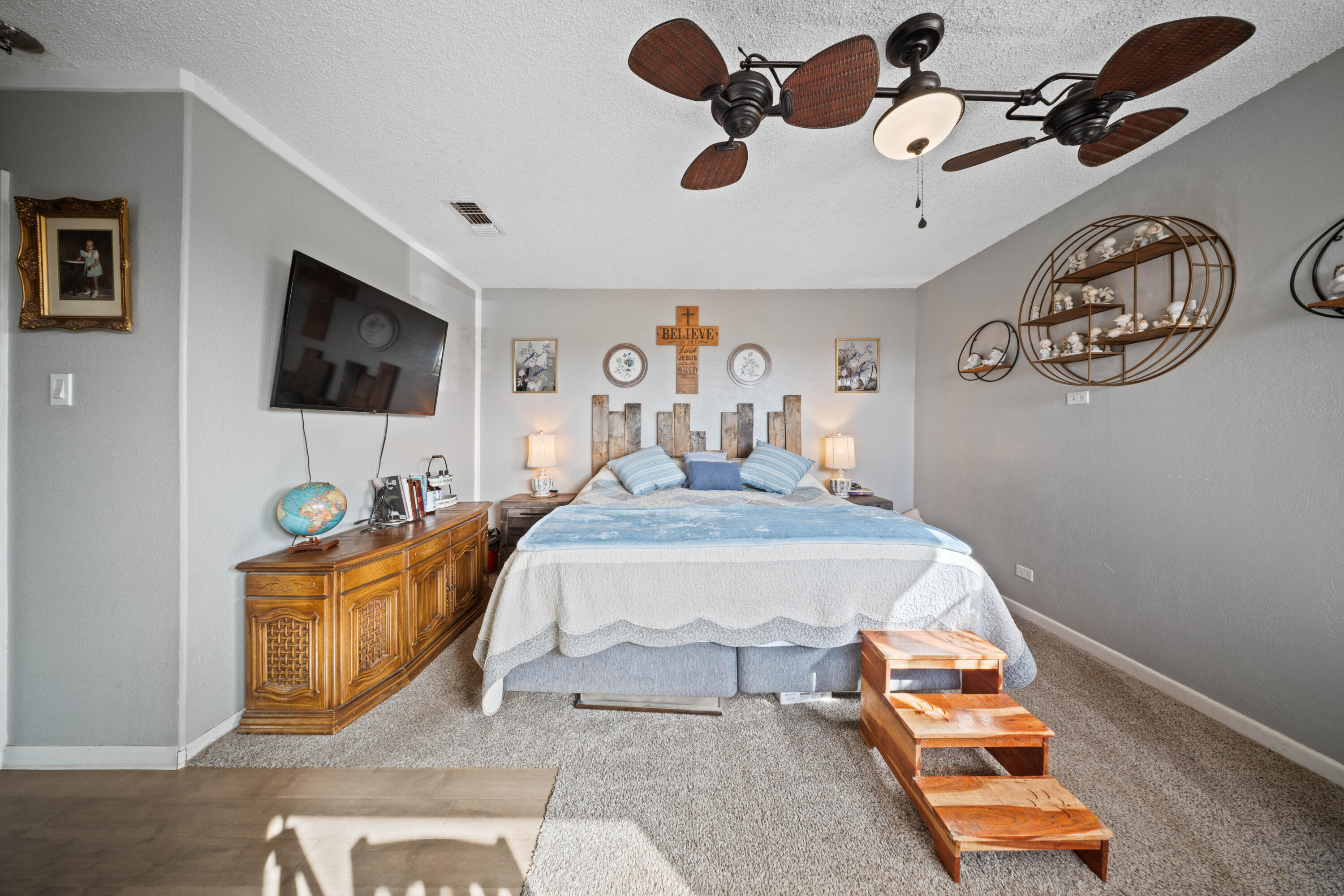 3725 Hawk Road Ropesville, TX 79358 - Photo 18 of 39 a bedroom with furniture and a flat screen tv