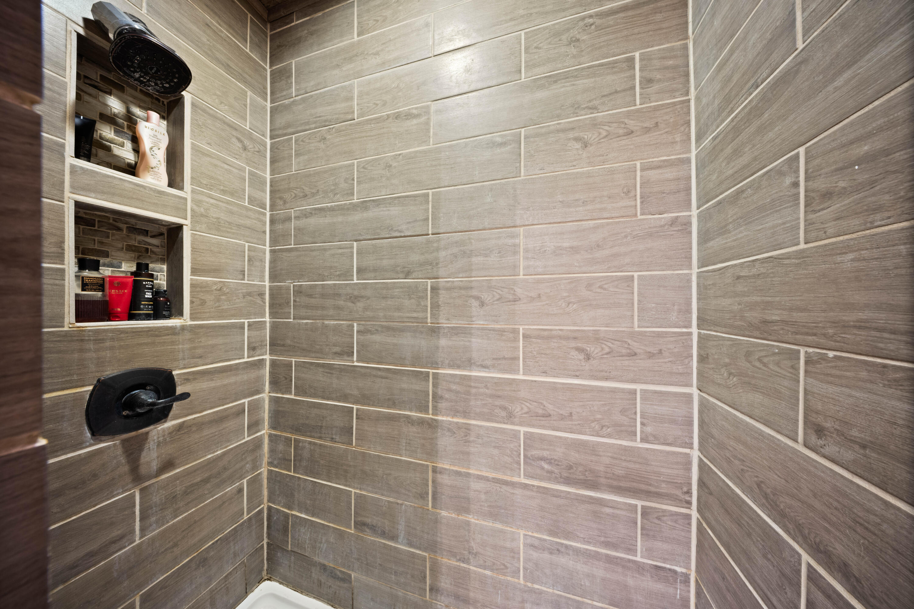 3725 Hawk Road Ropesville, TX 79358 - Photo 22 of 39 a bathroom with a sink and a shower