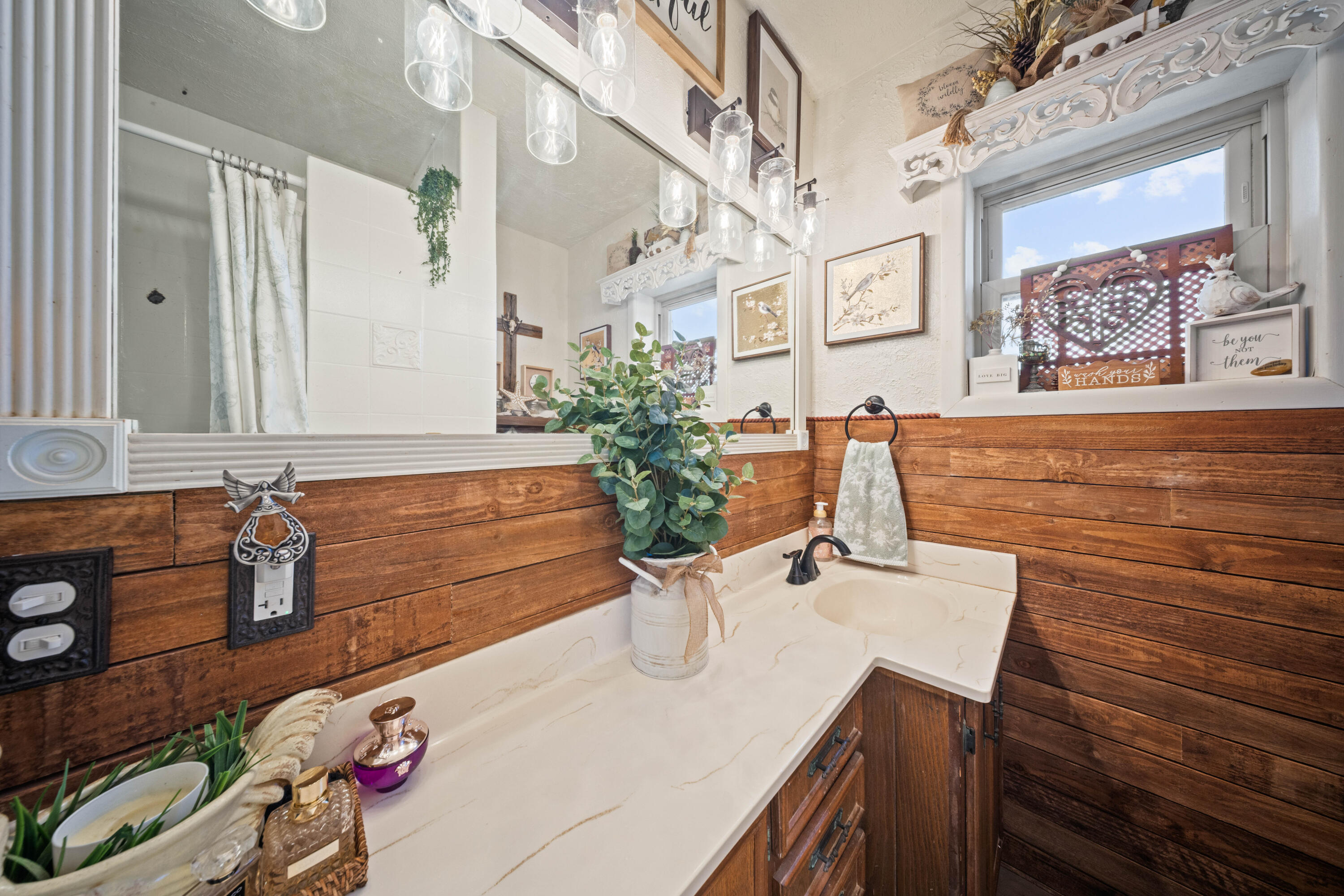 3725 Hawk Road Ropesville, TX 79358 - Photo 25 of 39 a bathroom with a sink and a mirror